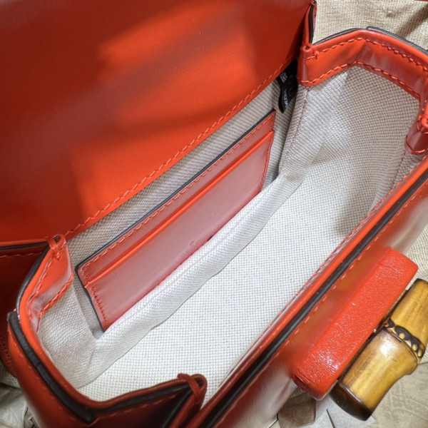 G*u*i mini top handle bag with bamboo